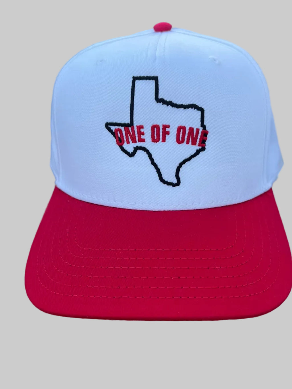 One of One Texas Logo performance caps