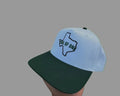 One of One Texas Logo performance caps